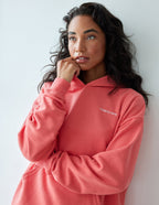 Elevated Faith Christian Hoodie in coral with front pouch pocket and soft fabric for comfort
