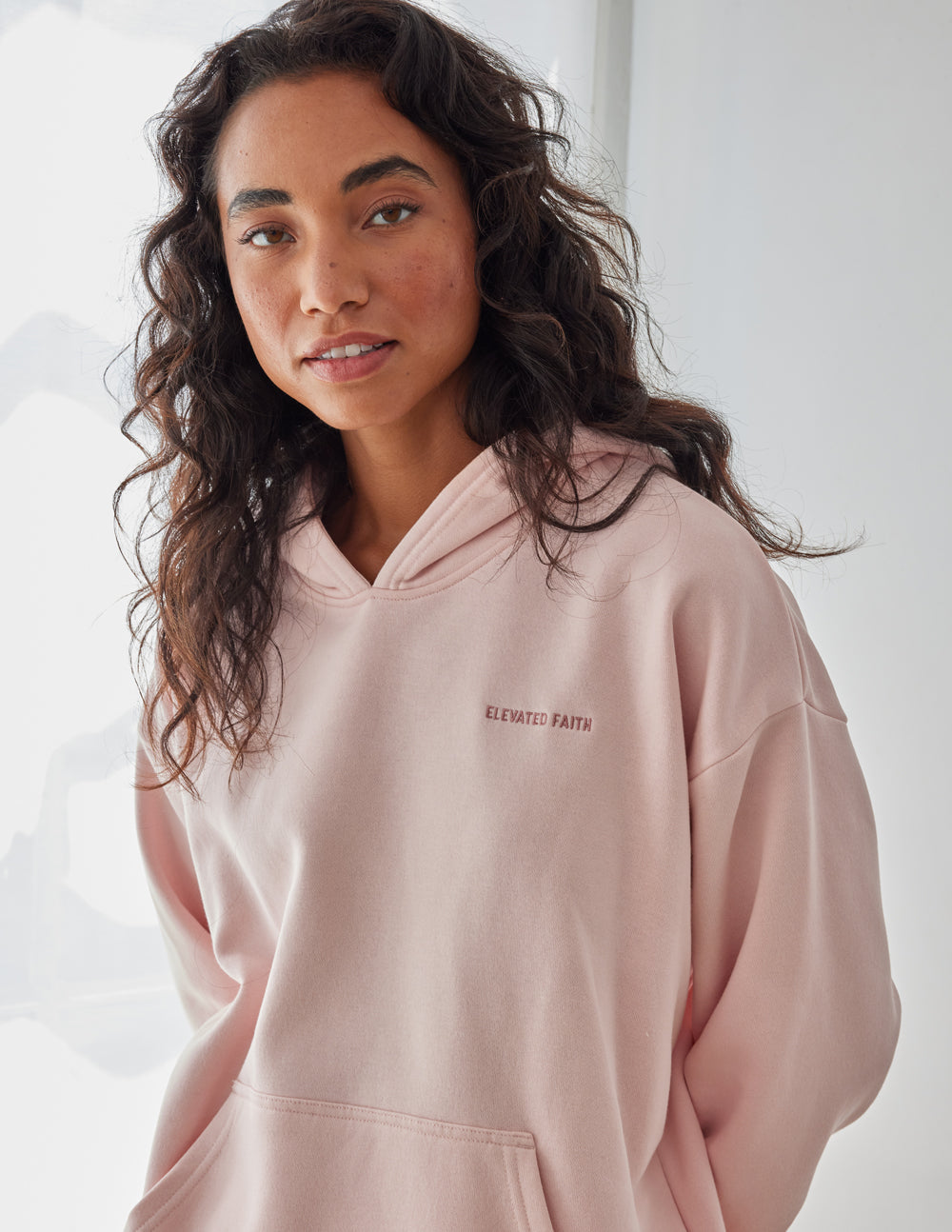 Elevated Faith Christian Hoodie in Light Pink with Cozy Fit and Front Pocket