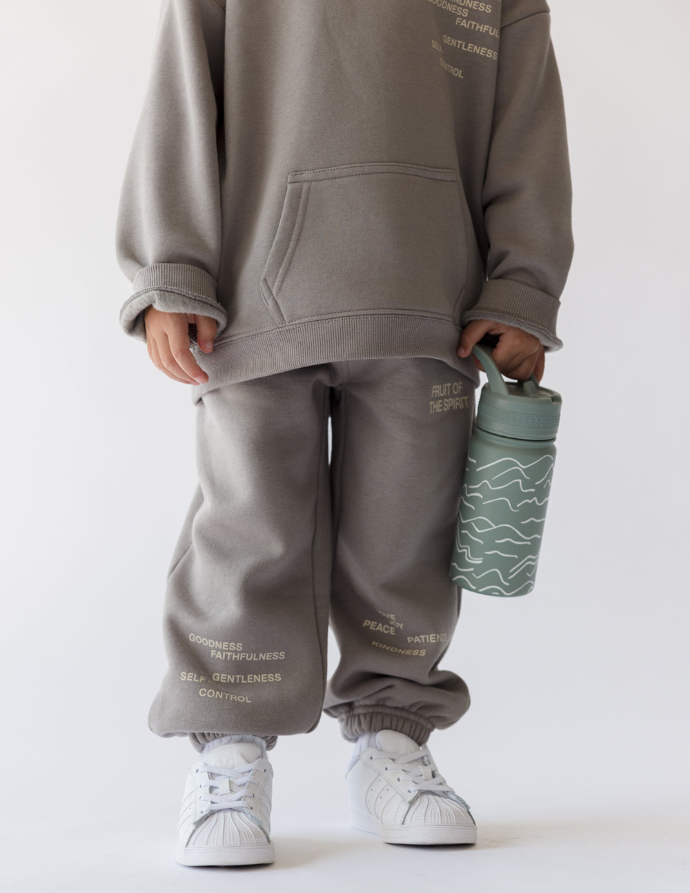 Elevated Faith Kids Water Bottle in Green with Fun Wave Design for Christian Kids Apparel