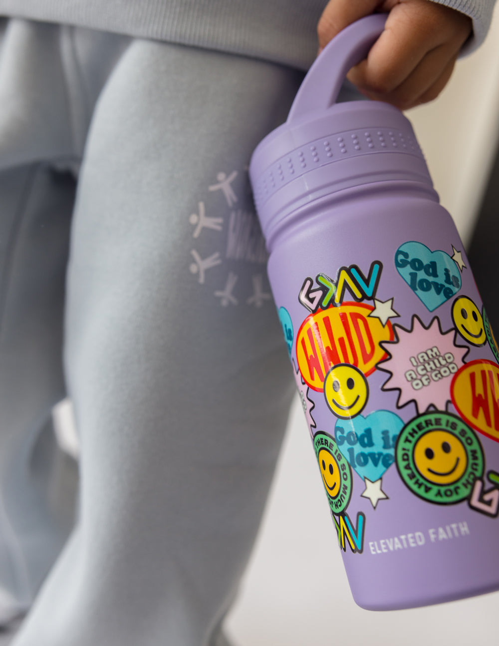 Elevated Faith Kids Water Bottle with Colorful Christian Kids Apparel Design Featuring Smiley Faces and Words of Faith