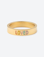 Elevated Faith Gold Ring with 'LOVED' Engraving, a Unique Piece of Christian Jewelry