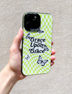 Elevated Faith Christian Phone Case with Checkerboard Design and Butterflies, featuring the phrase Grace Upon Grace