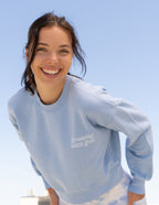Light blue Christian Crewneck Sweatshirt with 'Growing with God' text for comfort and faith.