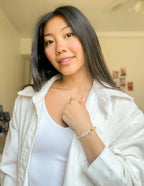 Elevated Faith Christian Jewelry Bracelet with colorful letters and beads on a gold chain