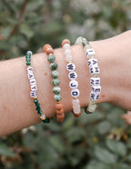 Elegant Christian Jewelry Bracelet stack featuring stone beads and inspirational messages for faith enthusiasts