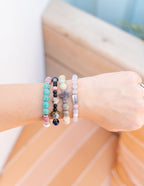 Elevated Faith Christian Jewelry Bracelet collection featuring various colorful stone designs on a wrist