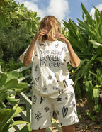 Elevated Faith Christian Shorts with playful designs, featuring flowers and inspirational words