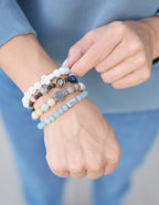 Elevated Faith Christian Jewelry Bracelet stacked with various stone designs for faith-inspired style