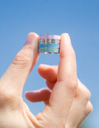 Elevated Faith Christian Jewelry Ring in pastel colors featuring peace inscriptions for stylish faith expression