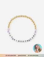 Elevated Faith Christian Jewelry Bracelet with gold beads and letters spelling THY KINGDOM COME