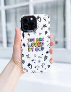 Christian iPhone Case with colorful 'You Are Loved By God' design and doodle elements