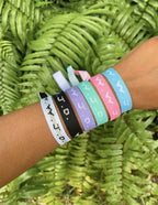 Colorful Elevated Faith Christian Jewelry Bracelet Set on a wrist with various inspirational designs