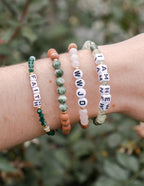 Elevated Faith Christian Jewelry Bracelet with letter beads and natural stones on a wrist